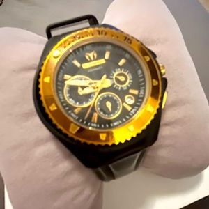 Technomarine Black and Gold watch